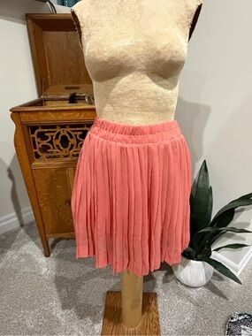 Pleated Coral Mini Skirt